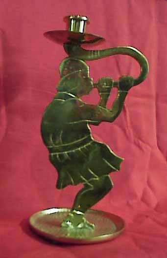 Folkart candlestick, Man Blowing Horn, hand cast in brass